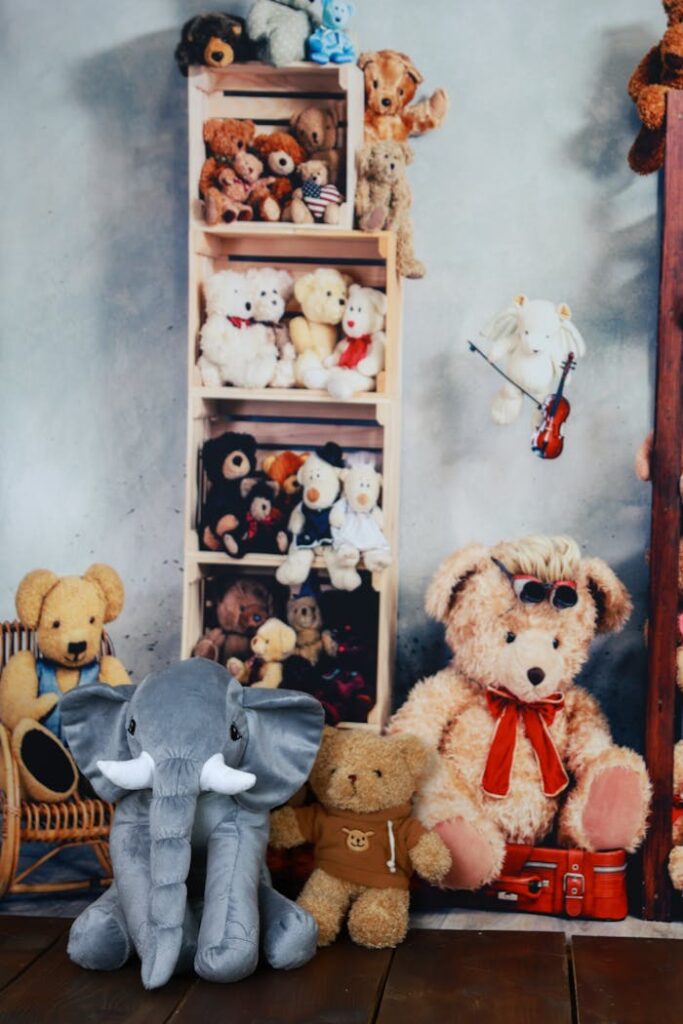 Charming arrangement of plush teddy bears and a stuffed elephant in a cozy indoor setting.